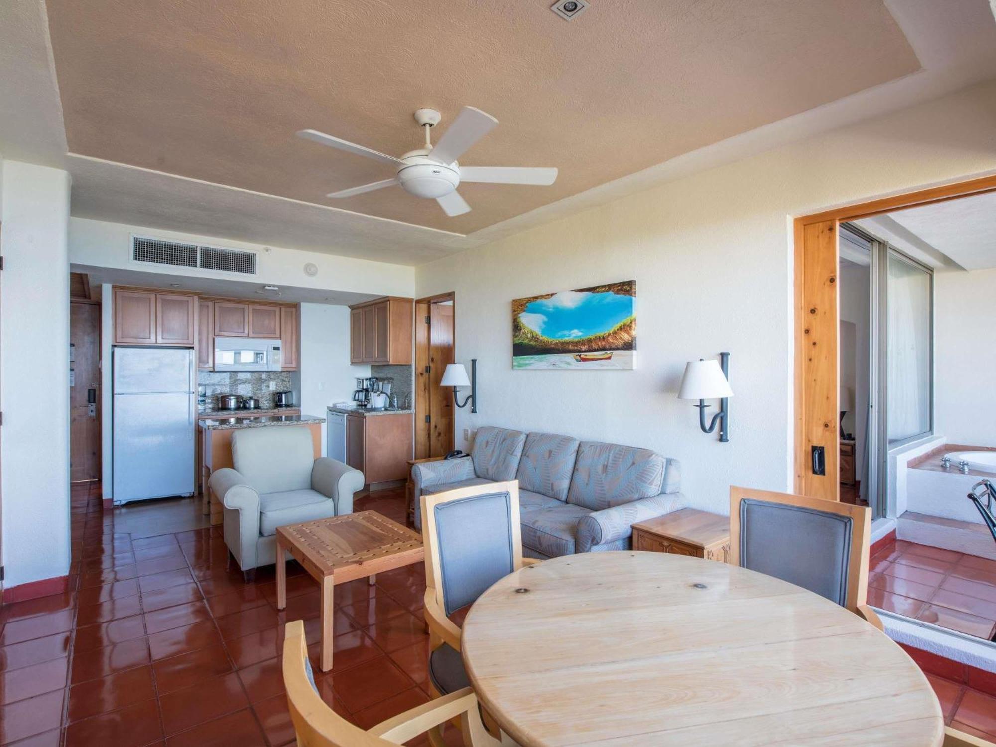Two-Bedroom Deluxe King Suite with Balcony, Jacuzzi and Lagoon View